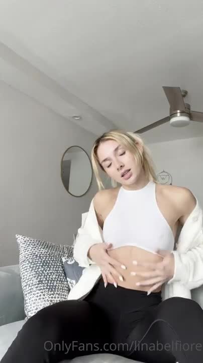 Lina Belfiore Undresses To Tease