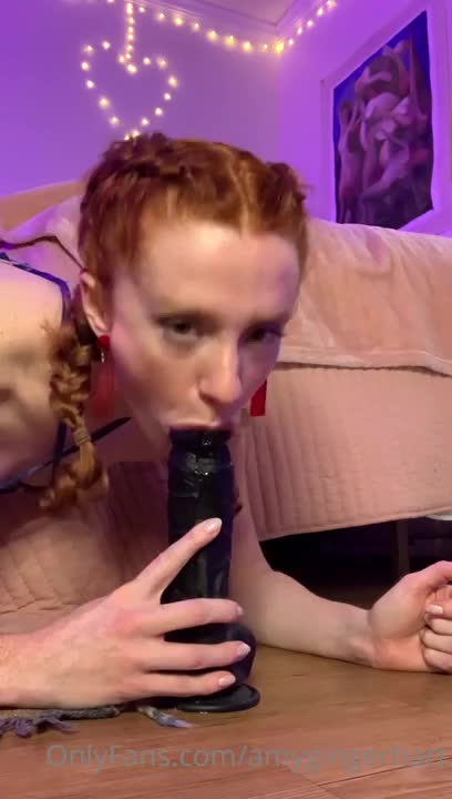 Amy Hart Bounces On Top Of Her Black Dildo