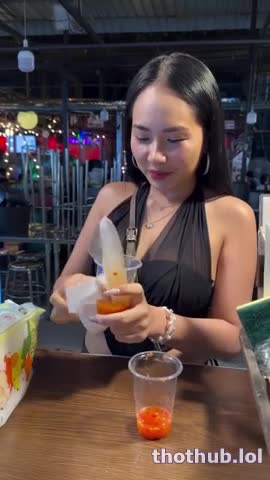 Asian eating fish