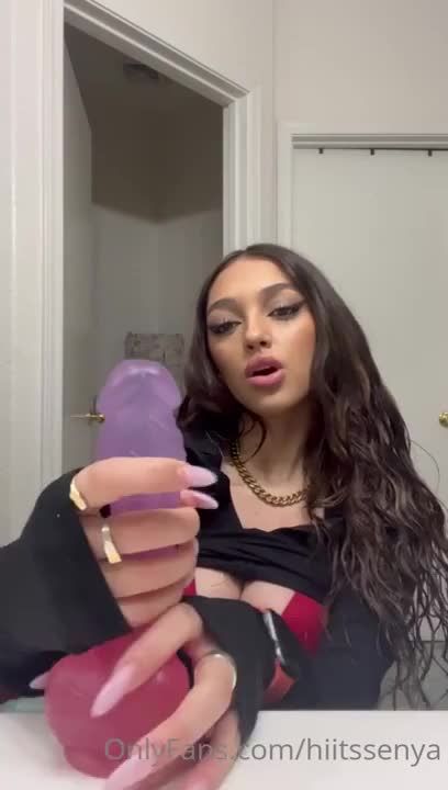Senya Marin Strokes & Sucks A Dildo In The Bathroom